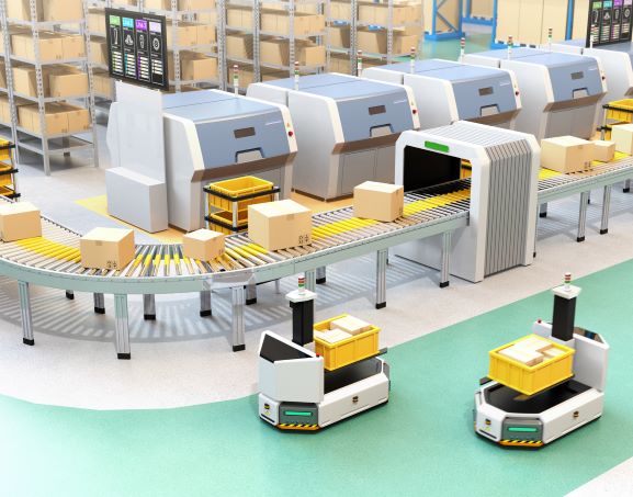 self driving AGV with forklift carrying container box beside conveyor 