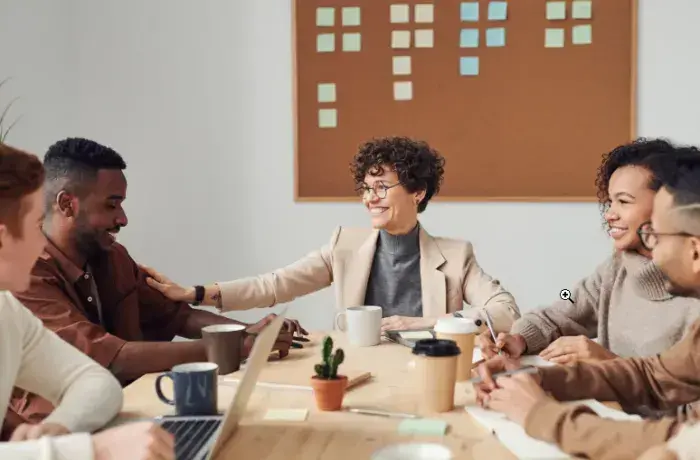 Employees in a meeting soft skils