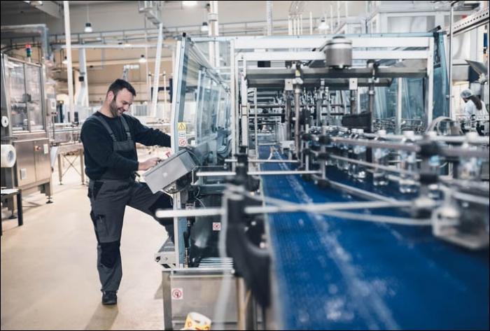 Employee in manufacturing facility