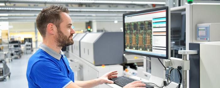 PLC Technician Working at terminal